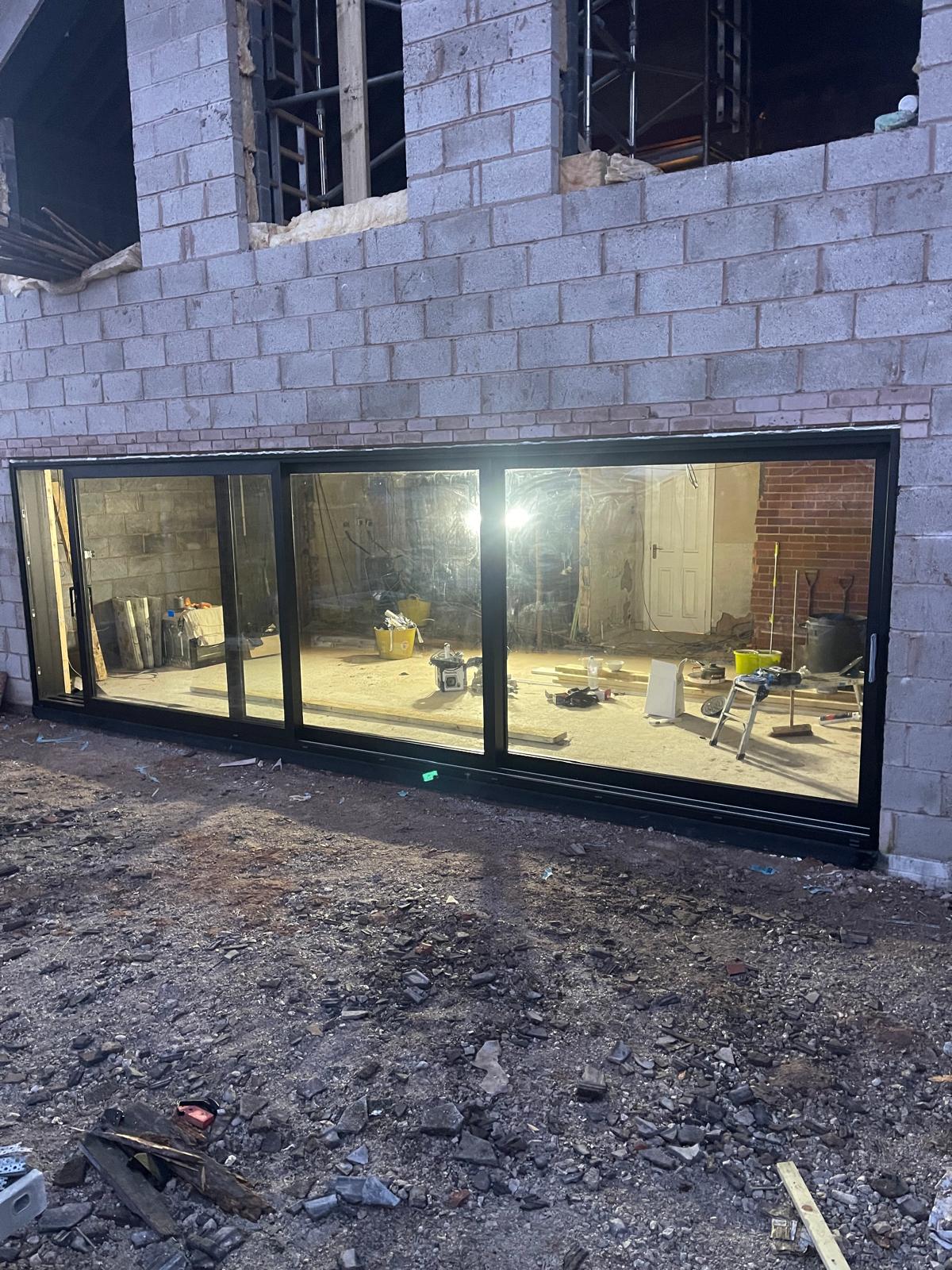 Aluminium lift and slide doors in Gresford with Reynaers MasterPatio system